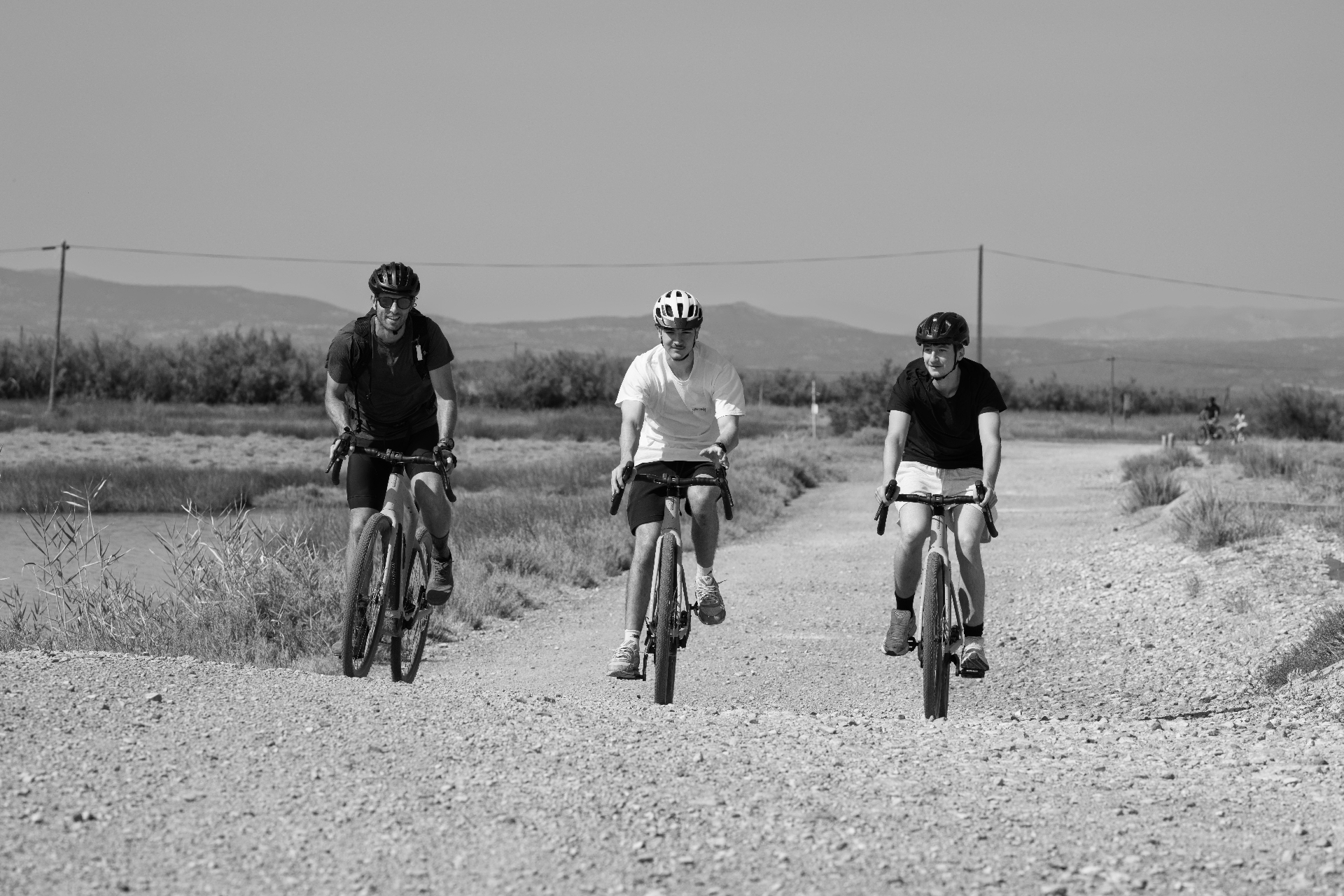 Group of three cyclists on the trail, Gruissan Outdoor